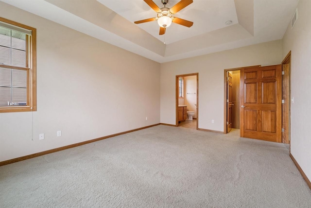 536 Coonen Dr, Combined Locks, WI 54113 - unfurnished bedroom with baseboards, light carpet, and a walk in closet