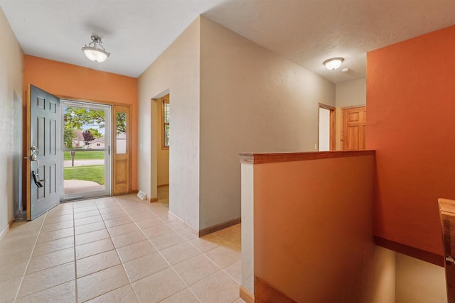 536 Coonen Dr, Combined Locks, WI 54113 - entryway with baseboards and light tile patterned floors