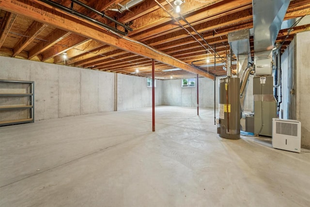 536 Coonen Dr, Combined Locks, WI 54113 - below grade area featuring water heater and heating unit