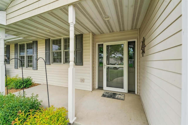 536 Coonen Dr, Combined Locks, WI 54113 - doorway to property featuring covered porch