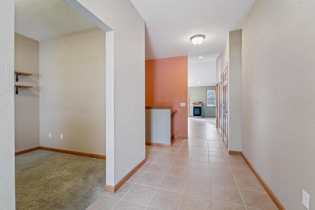 536 Coonen Dr, Combined Locks, WI 54113 - hallway featuring baseboards and light tile patterned flooring