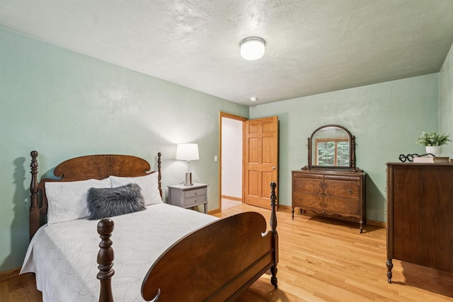 N6471 12 Corners Rd, Black Creek, WI 54106 - bedroom featuring wood finished floors and baseboards
