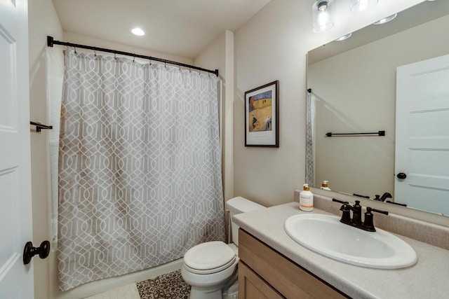 447 Crusader Pt, Waunakee, WI 53597 - bathroom featuring vanity, toilet, and recessed lighting