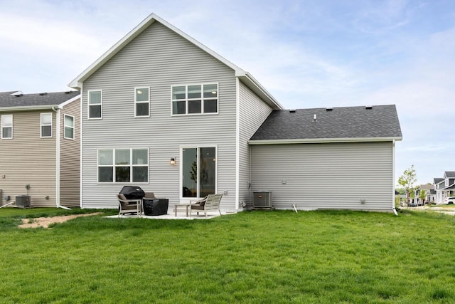 447 Crusader Pt, Waunakee, WI 53597 - back of house featuring a patio area, a lawn, and central AC unit