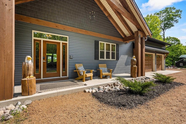 7272 Freedom Trl, Wabeno, WI 54566 - entrance to property featuring a garage and concrete driveway