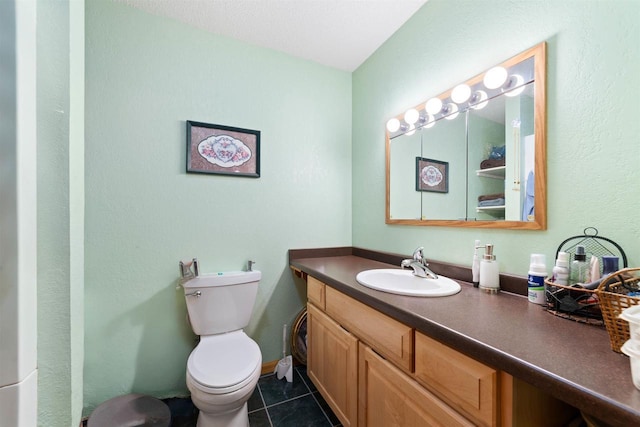 14303 Rock N Roll Ln, Gordon, WI 54838 - bathroom featuring vanity, toilet, and tile patterned floors