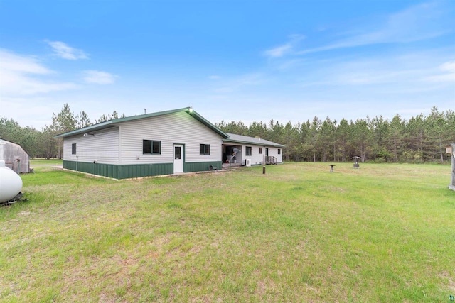 14303 Rock N Roll Ln, Gordon, WI 54838 - rear view of property with a yard