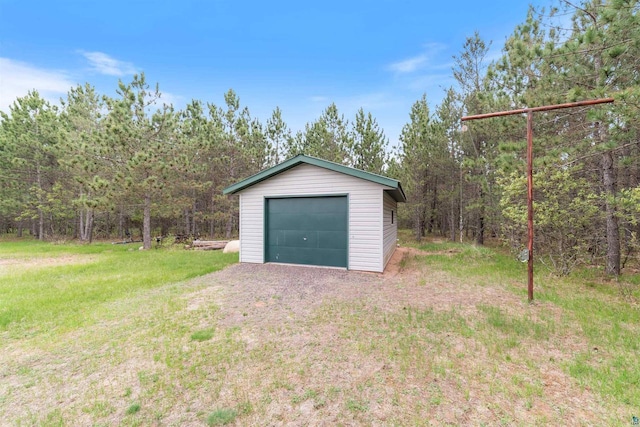 14303 Rock N Roll Ln, Gordon, WI 54838 - detached garage featuring a wooded view