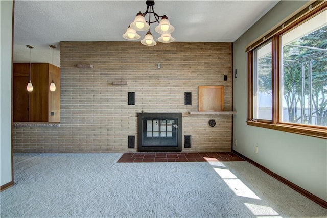 8303 163rd St, Chippewa Falls, WI 54729 - unfurnished living room featuring carpet, a fireplace with flush hearth, a chandelier, and brick wall