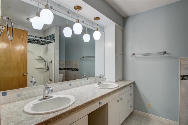 8303 163rd St, Chippewa Falls, WI 54729 - full bathroom featuring double vanity, a shower, and tile patterned flooring