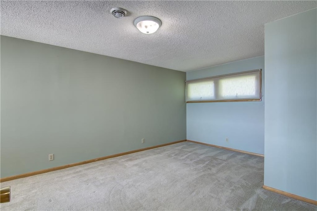 8303 163rd St, Chippewa Falls, WI 54729 - carpeted spare room with a textured ceiling
