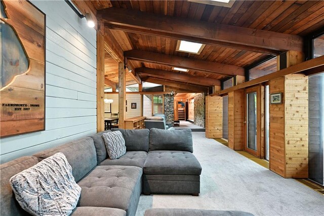 N5575 Schultz Ln, Stone Lake, WI 54876 - living area featuring wood walls, wood ceiling, and carpet floors