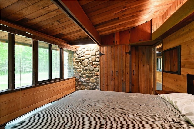 N5575 Schultz Ln, Stone Lake, WI 54876 - bedroom with wood ceiling, wood walls, and vaulted ceiling