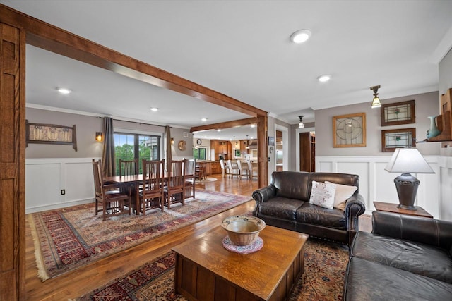 S28W31464 County Road De, Waukesha, WI 53189 - living area with a decorative wall, crown molding, wood finished floors, a wainscoted wall, and recessed lighting
