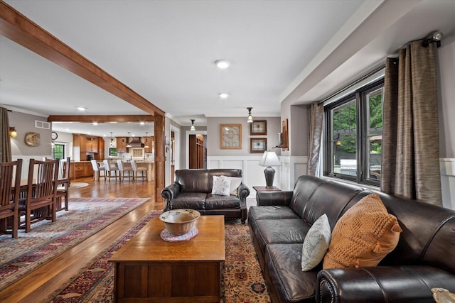 S28W31464 County Road De, Waukesha, WI 53189 - living area with healthy amount of natural light, wood finished floors, a wainscoted wall, and recessed lighting