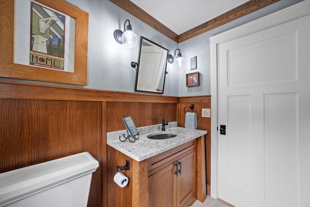 S28W31464 County Road De, Waukesha, WI 53189 - bathroom with vanity, ornamental molding, and wainscoting
