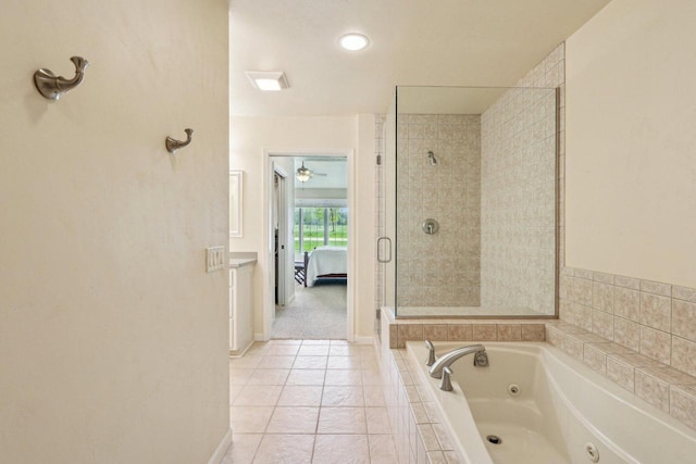 522 Otto Way, Elkhart Lake, WI 53020 - full bath with ensuite bath, a jetted tub, a tile shower, baseboards, and recessed lighting