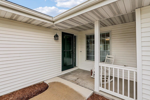 522 Otto Way, Elkhart Lake, WI 53020 - view of exterior entry with a porch