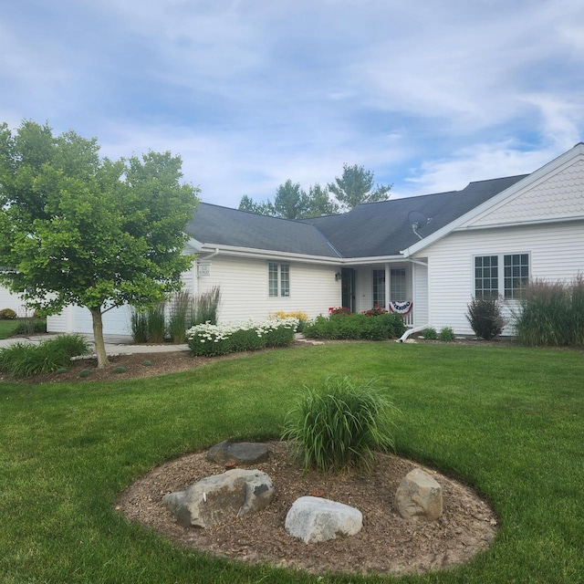 522 Otto Way, Elkhart Lake, WI 53020 - ranch-style home featuring a front yard and an attached garage