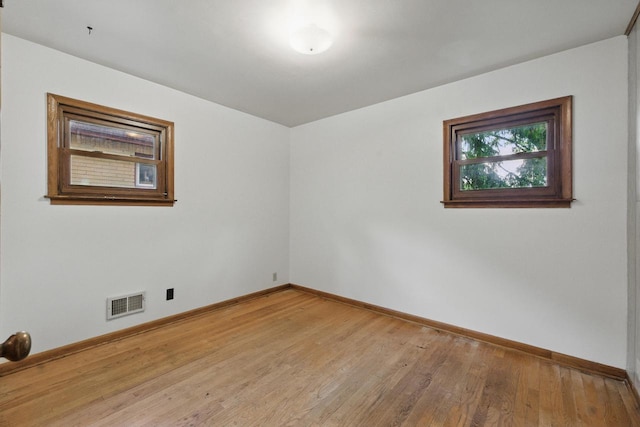 2507 S 94th St, West Allis, WI 53227 - unfurnished room with baseboards and light wood-type flooring