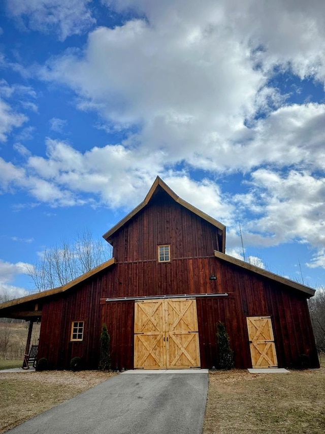1650 Trinity Ridge Cir, De Pere, WI 54115 - view of barn featuring asphalt driveway