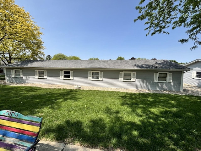 788 S River Rd Unit 7, West Bend, WI 53095 - back of house with a lawn