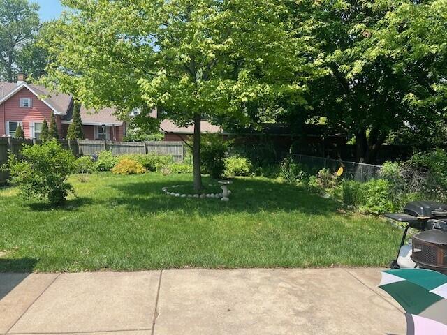 1906 Erie St, Racine, WI 53402 - view of yard with a patio