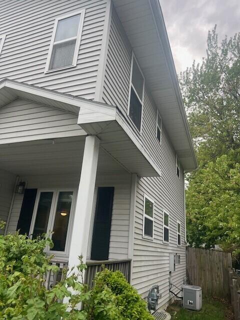 1906 Erie St, Racine, WI 53402 - view of side of home featuring central AC