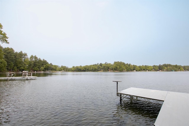 W5522 S Round Lake Rd, Wild Rose, WI 54984 - dock featuring a water view and a forest view