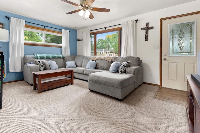 1413 E Marquette St, Appleton, WI 54911 - living area featuring light carpet, a ceiling fan, and baseboards