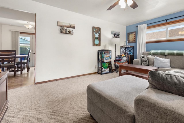 1413 E Marquette St, Appleton, WI 54911 - living room with light carpet, ceiling fan, and baseboards