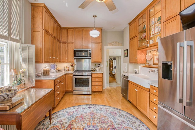 150 Rountree Ave, Platteville, WI 53818 - kitchen featuring appliances with stainless steel finishes, light wood-style flooring, and light countertops