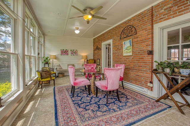 150 Rountree Ave, Platteville, WI 53818 - sunroom with brick wall and tile patterned floors