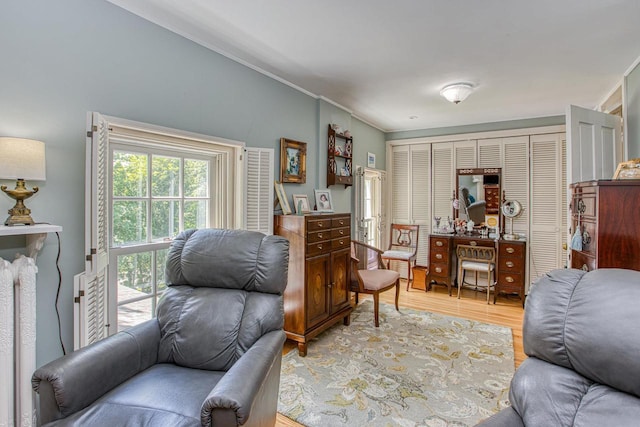 150 Rountree Ave, Platteville, WI 53818 - sitting room featuring light wood-style floors and crown molding