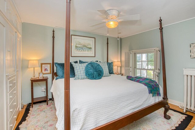150 Rountree Ave, Platteville, WI 53818 - bedroom with wood finished floors, ceiling fan, and baseboards