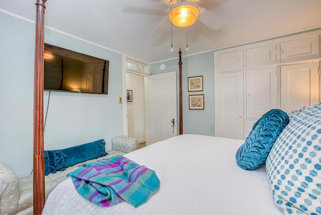 150 Rountree Ave, Platteville, WI 53818 - bedroom featuring crown molding, a closet, and a ceiling fan