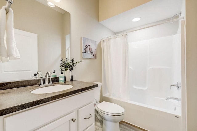 1320 Prairie Creek Cir Unit 2, Oconomowoc, WI 53066 - bathroom featuring vanity, shower / bath combination with curtain, and wood finished floors