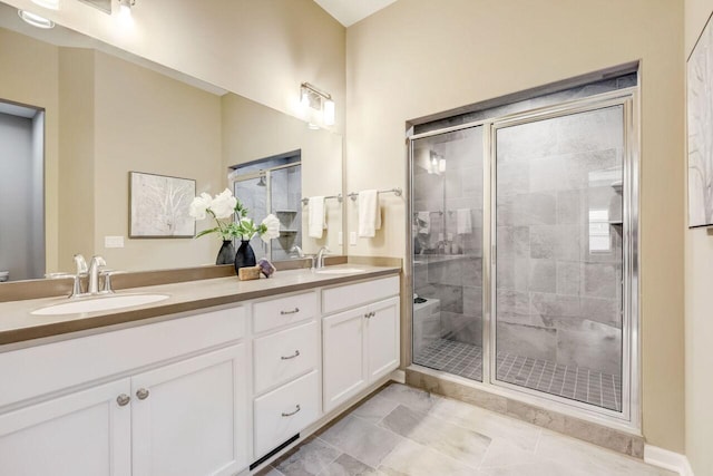 1320 Prairie Creek Cir Unit 2, Oconomowoc, WI 53066 - full bathroom with double vanity and a stall shower