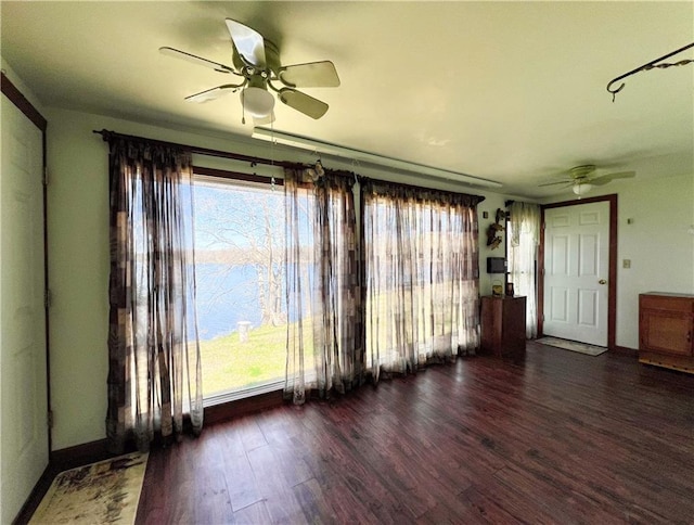 999 Mcgill Point Rd, Weyerhaeuser, WI 54895 - empty room with a ceiling fan, wood finished floors, and baseboards