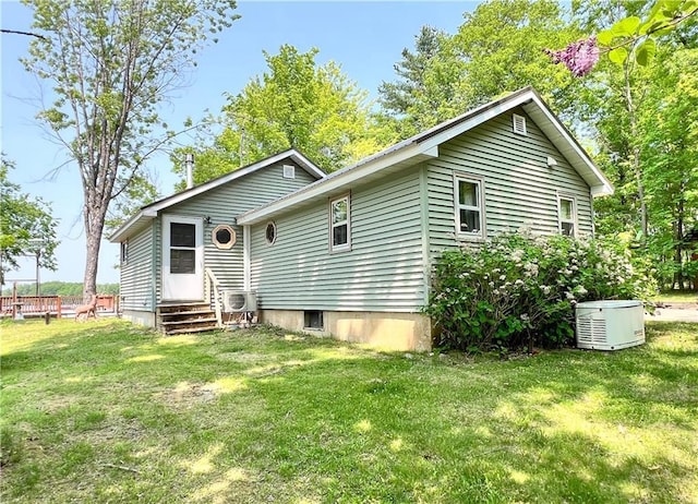 999 Mcgill Point Rd, Weyerhaeuser, WI 54895 - back of house with entry steps and a yard