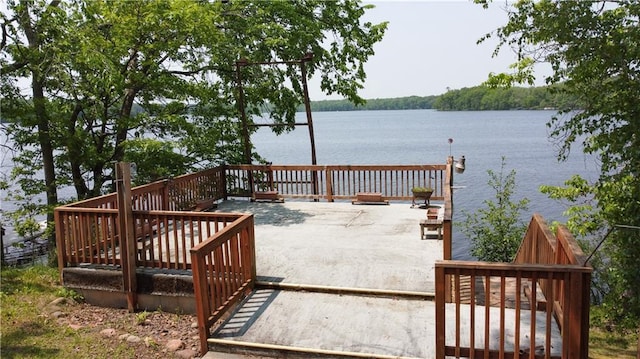 999 Mcgill Point Rd, Weyerhaeuser, WI 54895 - wooden terrace with a water view and a patio
