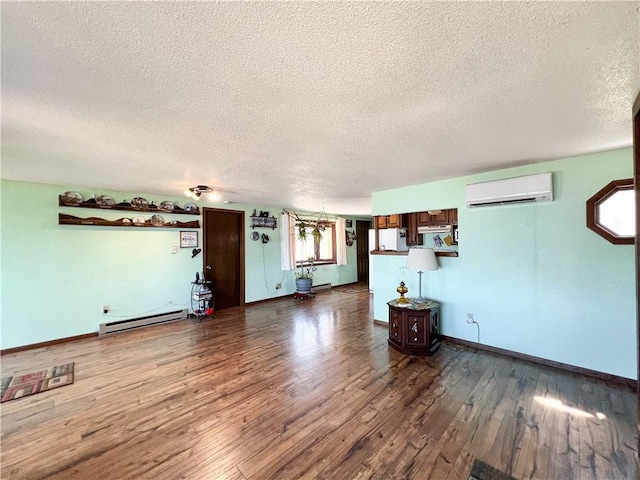 999 Mcgill Point Rd, Weyerhaeuser, WI 54895 - living room with a wall mounted AC, a baseboard heating unit, a textured ceiling, dark wood-style floors, and baseboards