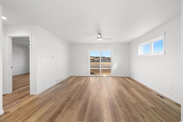 1200 Sween Dr Unit 4, Holmen, WI 54636 - spare room with a ceiling fan, light wood-type flooring, a smoke detector, and baseboards