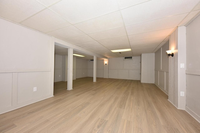 15710 Kata Dr, Elm Grove, WI 53122 - finished below grade area featuring light wood-style floors and a paneled ceiling