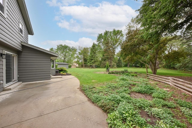 15710 Kata Dr, Elm Grove, WI 53122 - view of green lawn featuring a patio