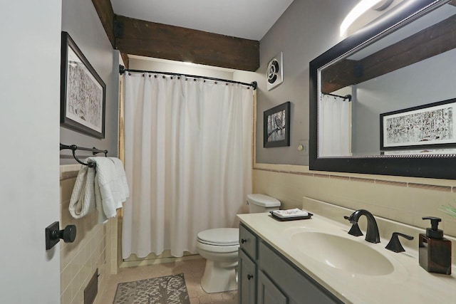 940 Alpine Dr Unit 01, Fontana, WI 53125 - full bathroom featuring tile walls, toilet, vanity, tile patterned flooring, and a shower with curtain