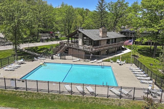 940 Alpine Dr Unit 01, Fontana, WI 53125 - community pool with stairs and a patio