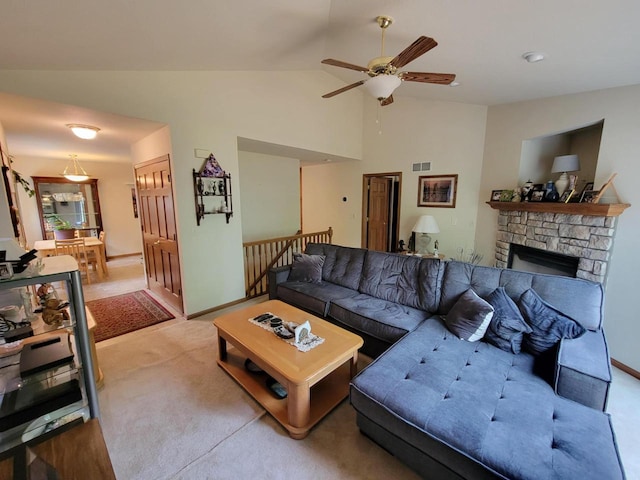 2832 E Somers Ct, Cudahy, WI 53110 - living room with vaulted ceiling, ceiling fan, carpet flooring, a fireplace, and baseboards