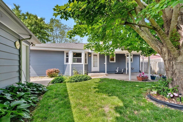 4415 Olive St, Racine, WI 53405 - view of front of house with a patio area