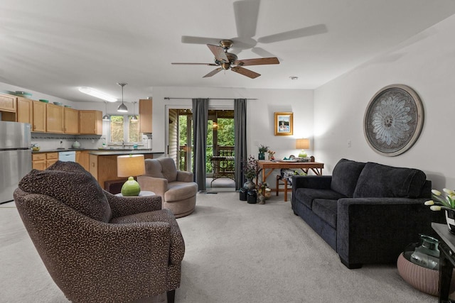 91 Potawatomi Rd Unit N-2, Williams Bay, WI 53191 - living area featuring light colored carpet and a ceiling fan